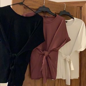 Three express tops- black, white, and cream